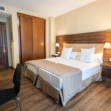 Abetos Del Maestre Escuela